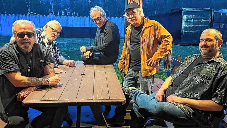 Fans of the Dead, the Doors, rejoice <b>Feast of Friends recreates the music of the Doors on Friday night at Blue Arrow Farm in Pine Island, N.Y. (Photo courtesy of Feast of Friends)</b>