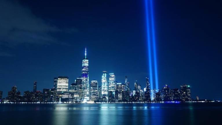 Local Sept. 11 events Two beams of light are projected in the sky on the anniversary of the Sept. 11, 2001, terrorist attacks on the World Trade Center in New York.