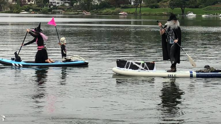 Participants decorated their paddleboards. (Photo by Kathy Shwiff)