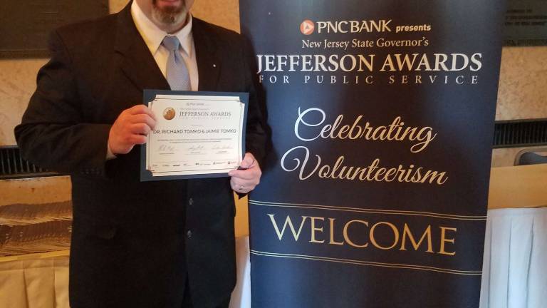 Tomkos honored with Jefferson Award Tomkos honored with Jefferson Award