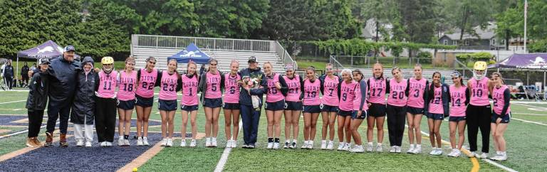 Team raises $1,800 to fight breast cancer Team raises $1,800 to fight breast cancer