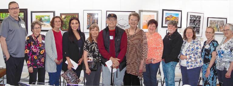 Cameron wins Best in Show Winners of the 37th annual Skylands Regional Juried Art Exhibition with executive director Joseph Fontana, left, and staff members.