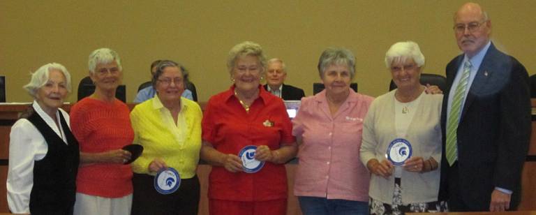 Residents commended for their contributions Vivian Rosenthal, Rosemarie Felsheim, Connie Robison, Birdie Bezursik, Joan Shaw, Kay Brewer, with Councilman Gil Gibbs.