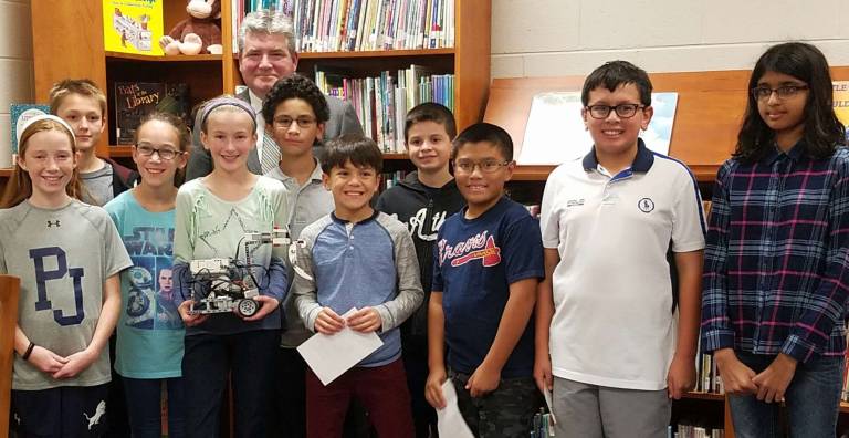 Pope John robotics teams share ideas with Sen. Oroho PJMS Panthers with Sen. Oroho. Danielle, Jacob, Mia, Bridget, Christian, Spenser, Charlie, Jaysen, Mark, Anika.