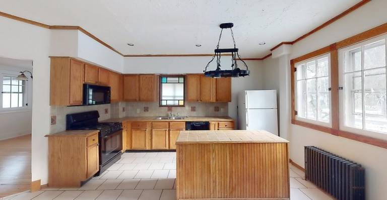 Updated two-story farmhouse with Old World charm in a great location Updated two-story farmhouse with Old World charm in a great location