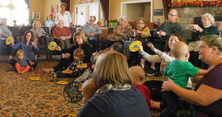 Toddlers and seniors take part in a Generations music class, led by Heather Donnelly of Sing A Song NJ, at the Bentley Assisted Living Facility in Branchville on Friday, Oct 4, 2019.