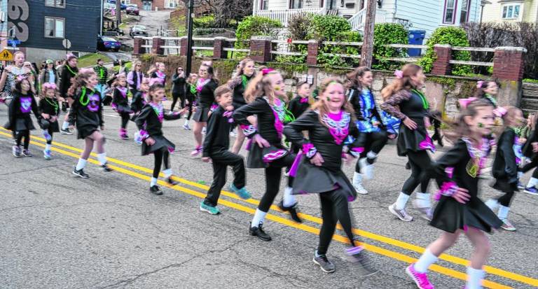 Students of the Lenahan School of Irish Dance in Sparta march in the parade.