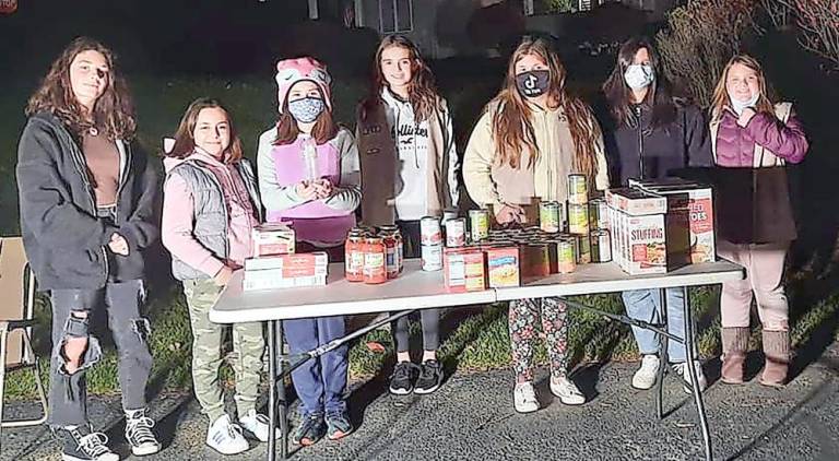 The Wallkill Valley Girl Scouts donated seven complete dinner bags and 12 turkeys (Photo provided)