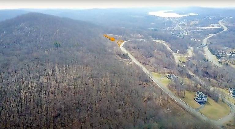 Sparta to buy Holland Circle plot for emergency access to the Glen Orange arrow points to the 1.59-acre parcel at 33 Holland Circle (realtor.com)