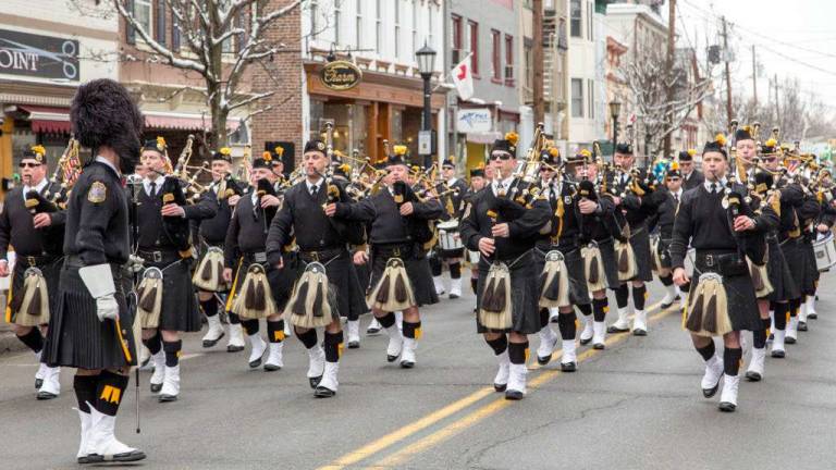 Annual St. Patrick's parade Saturday Bag pipers are an Irish tradition at the annual parade.
