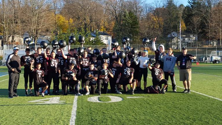 Big wins for Sparta Bears Sparta Bears 8th grade Level A team celebrates on the turf after a victory at home over Scotch-Plains Fanwood, 36-8. Sparta Bears advances to the NJSYFL American Division championship on Nov. 15.