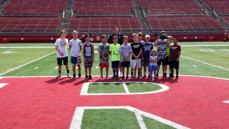 Sparta Bears attend Rutgers football practice From left, Troy Schmitzer, Lucas Hien, Rocco Gorvan, Jake Koerner, Logan Sergent, Coach Mantz, David Maasbach, Pat Dunn, Christian ‘Booey’ Rodriguez, Parker Hien, Ava Koerner, Nick Szabo, Nick Curry and Henry Lee