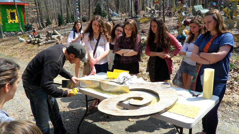 Sculpture Garden adds artistry to high school grounds Ricky Boscarino shows the Sparta art students some techniques