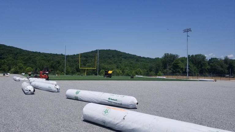 Sparta's new turf has been unfolded at the High School athletic field this week.