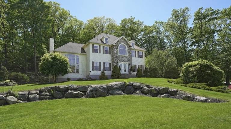 Curb-appeal home with custom features and timeless floor plan Curb-appeal home with custom features and timeless floor plan