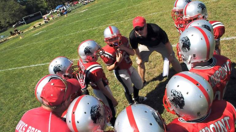 Players on the field at Brookside Park during a past season (File photo by Nicholas Ortiz)