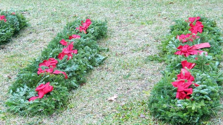 Wreaths ready to be placed on veterans’ graves in Glenwood Cemetery as part of Wreaths Across America (Photo by Janet Redyke)