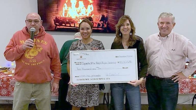 The Sparta VFW accepts $10,000 in 2021 Christmas tree sales funds to be used towards this year's Ralph Rojas Scholarships (from left): Peter Litchfield, Rosemarie Russell, Jackie O’Donnell, Stan Tryba. (Photo by John Schoch)