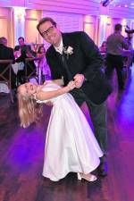 Ainsley Kane dances with her father, Charlie.