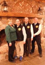 Caption: (L-R) Sussex County Health and Humans Services Administrator Carol Novrit, Mohawk House owner Steve Scro, Sparta Chief of Police Neil Spidaletto, and Byram Chief of Police Pete Zabita at the Mohawk House on Thursday, Nov 7, 2019 as they plan this year's countywide Stuff the Bus food drive to benefit the Sussex County Food Pantry.