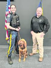 Detective Catherine Young and K9 Nutmeg pose with Sheriff Michael Strada. (Photo provided)