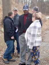 Vernon Township Mayor Howard Burrell talks to Environmental Commission member and Silver Spruce Drive resident Peg Distasi in February.