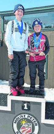 Patrick and Nicholas Brocky of Sparta are shown on the podium.
