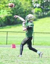 Sussex Tech quarterback Joey Scarpone throws the ball.