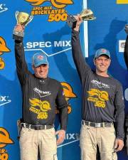 Mike McCarrick, left, and Johnny Langeraap, both of Sparta, place third in a national brick-laying competition. (Photo provided)