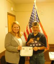 Cheryl Krouse (L), Director of Community Outreach for Rep. Josh Gottheimer (D NJ5) presents American Legion Lt. Charles A. Meyer Post 86 Post Commander Tony Gallopo (R) with a flag that was previously flown over the U.S. Capitol Building in Washington, D.C. on Monday, Oct 14, 2019.