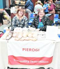 Emily and Heidi Bilik of Fredon sit at the Tranquility Tempations table.