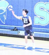 Sparta's Joshua Tolentino is about to serve. Tolentino had 9 kills, 3 digs and 1 ace.