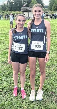 Sparta girls’ cross country captains Celia Rossettini and Sierra Harms