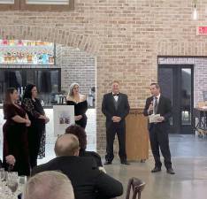 From left, Lisa Tremonte, Laura Tremonte, Julia Dick, Salvatore Dispenziere III and Brad Haimowitz present the Michael De Vito Jr. Scholarship at the ERC Charities’ gala Feb. 2 at Perona Farms. (Photos provided)