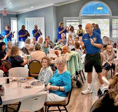 The Knights of Columbus Council 588 serves a BBQ dinner to 65 senior citizens in Sparta on Monday, Aug. 25. (Photo provided)