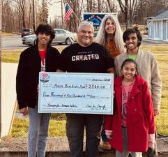 From left are Aneesh Iyer; Vincent Mann, chief of Ramapough Lunaape Nation; Mikie Mann; Ayush Iyer; and Vanya Iyer. (Photo provided)