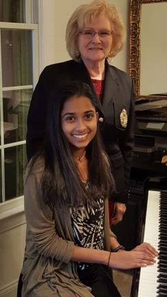 Piano student Lomaani Ranasinghe and piano teacher Joan Farrington