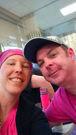 Robin with husband John, at her chemotherapy treatment.