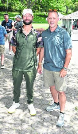 Matthew Zwerver of Franklin and Jim Lame, a retired ogdensburg police officer pose for a photo.
