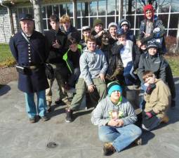 Members of Boy Scout Troop 81 are pictured with the Abraham Lincoln statue in Gettysburg.