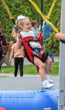 <b>Skyler Lucas on the swings.</b>