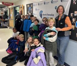Helen Morgan School’s “Be the Change” worked with Pass it along to collect 79 coats for Project Self Sufficiency. Photos provided.
