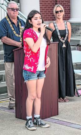 Natalie Torres sings the National Anthem.