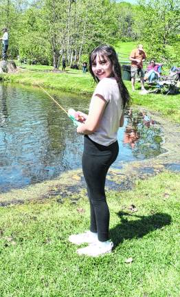 Alexa Hurley fishes.
