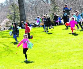 Children run to find eggs at Sparta UNICO’s 26th annual Easter egg hunt Saturday, March 30 at Dykstra Park. (Photo by Maria Kovic)