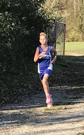 Molly Riva, a member of Tooker's team, was one of the top finishers in the girls' seventh grade race.