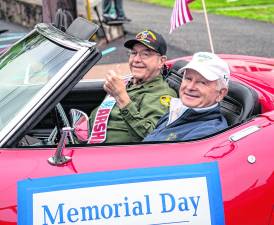 Grand Marshall Ed Liebig has a purple heart and was the former Vo Tech prinicpal.