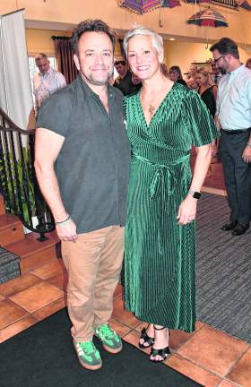 Andre and Tracy Dewaal, vice president of the board of Katie's House, Inc., pose for a photo.