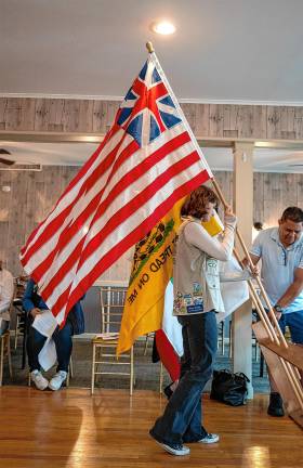FL1 Elsa Riley places a continental flag during the Flag Day Service on Friday, June 13 at the Sparta Elks Lodge #2356. (Photos by Nancy Madacsi)