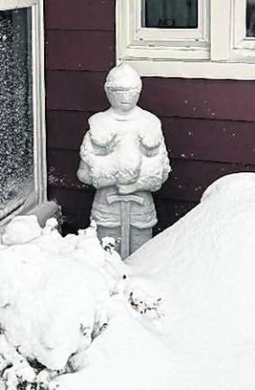 This photo, submitted by reader Janet Knight of Sparta shows a snow-covered knight statue during a recent storm.